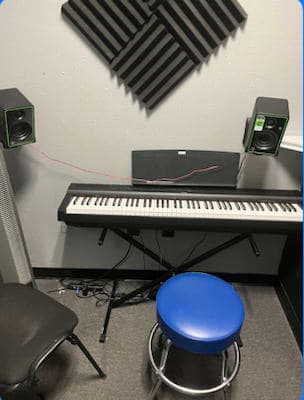 Mackell Mendoza's piano studio background